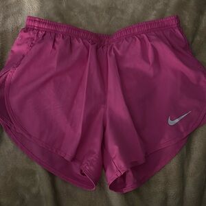 Hot pink Nike running shorts